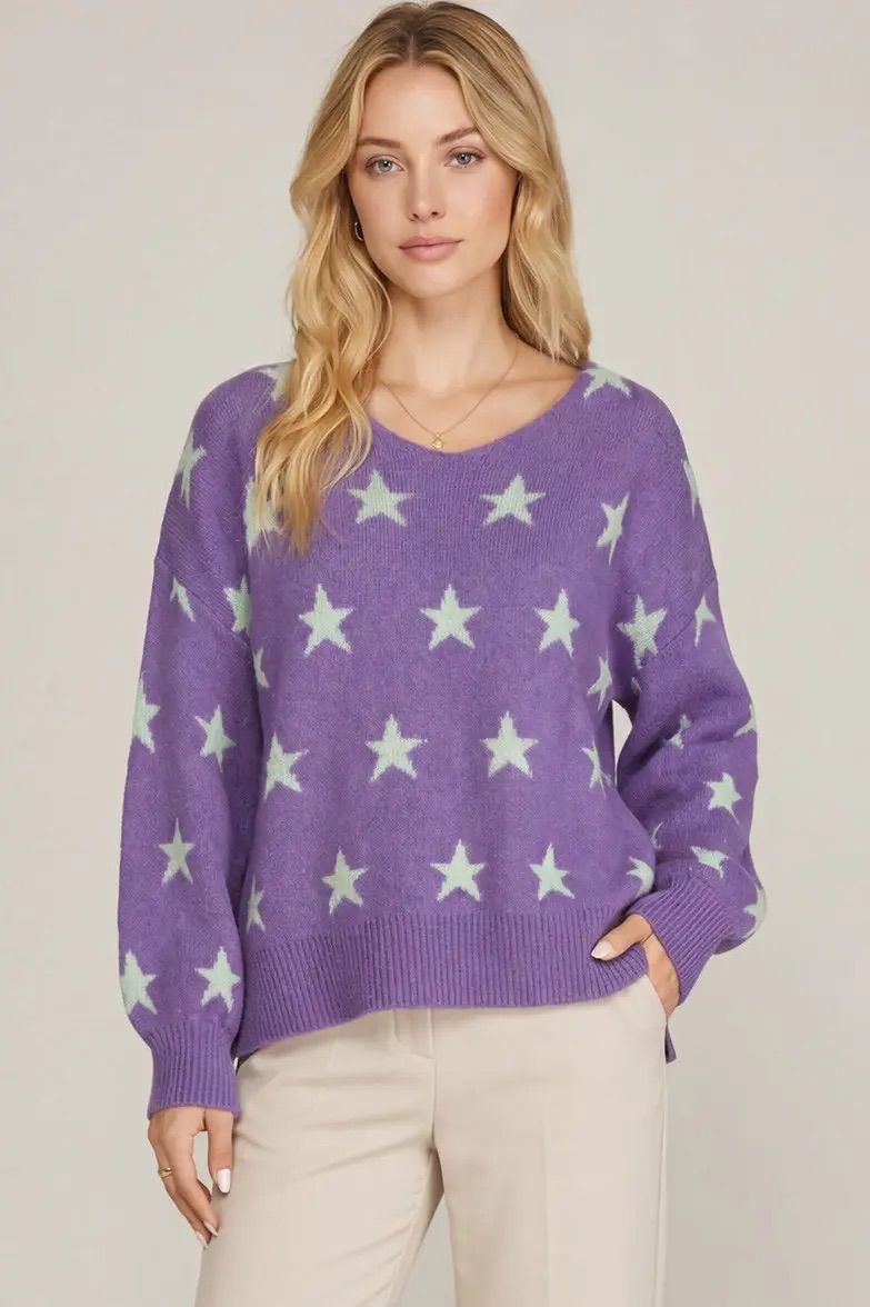 Suéter morado estrellas
